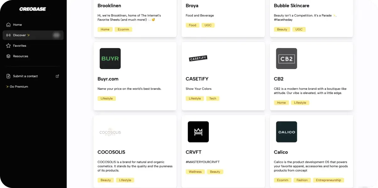 The Creobase Discover app built on Rowmesh, a directory of brand cards with category tags