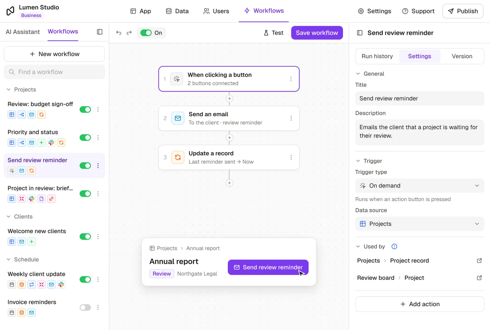 A Rowmesh on-demand workflow, "Send review reminder": when a button is clicked it emails the client a review reminder and records when it was sent. Its settings show the trigger type On demand, which runs when an action button is pressed, on the Projects table, used by buttons on two pages. In front, the "Send review reminder" button on the record page of a project in Review.